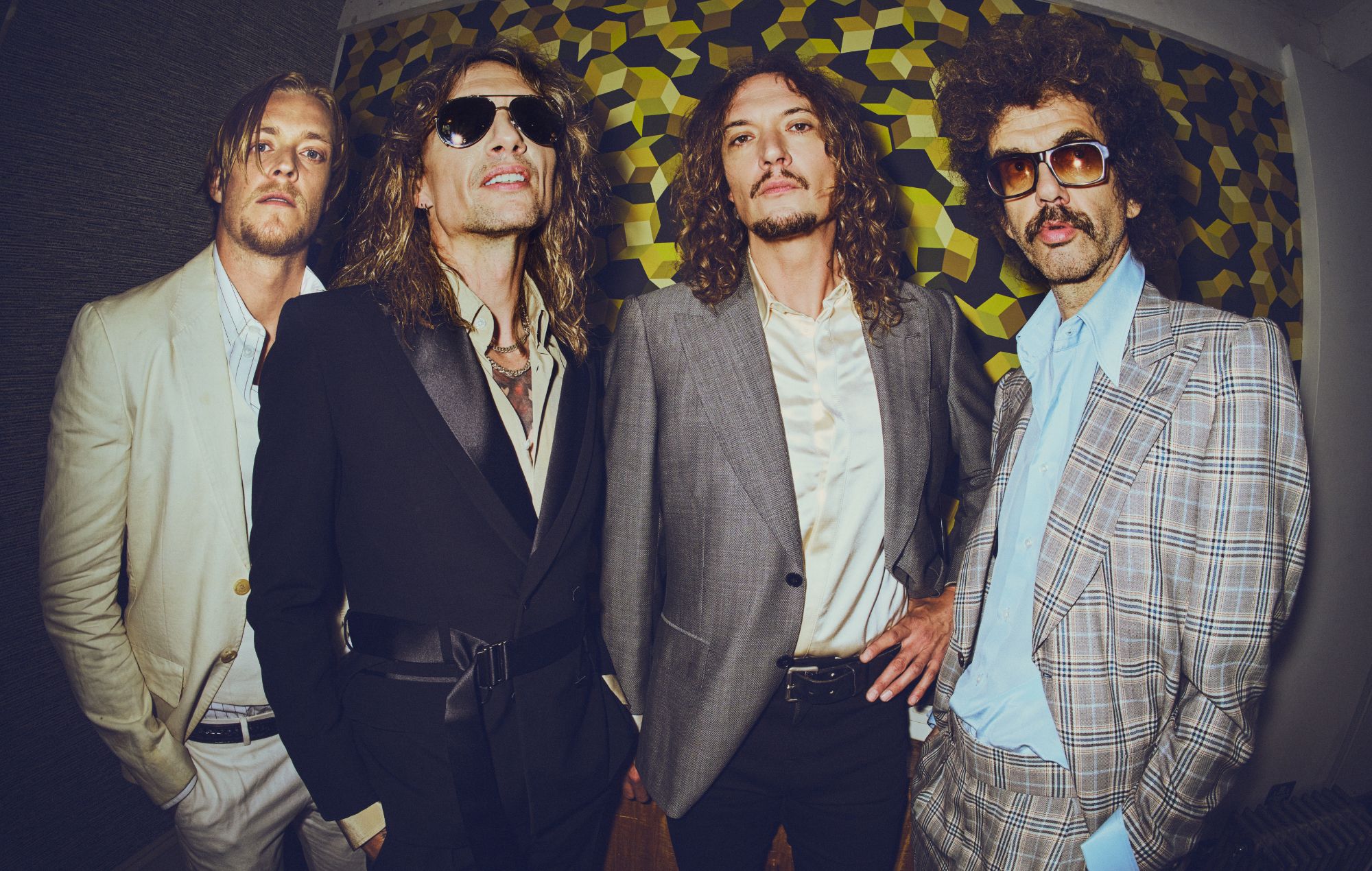 Listen to The Darkness’ punk-inspired new single ‘I Hate Myself’ 