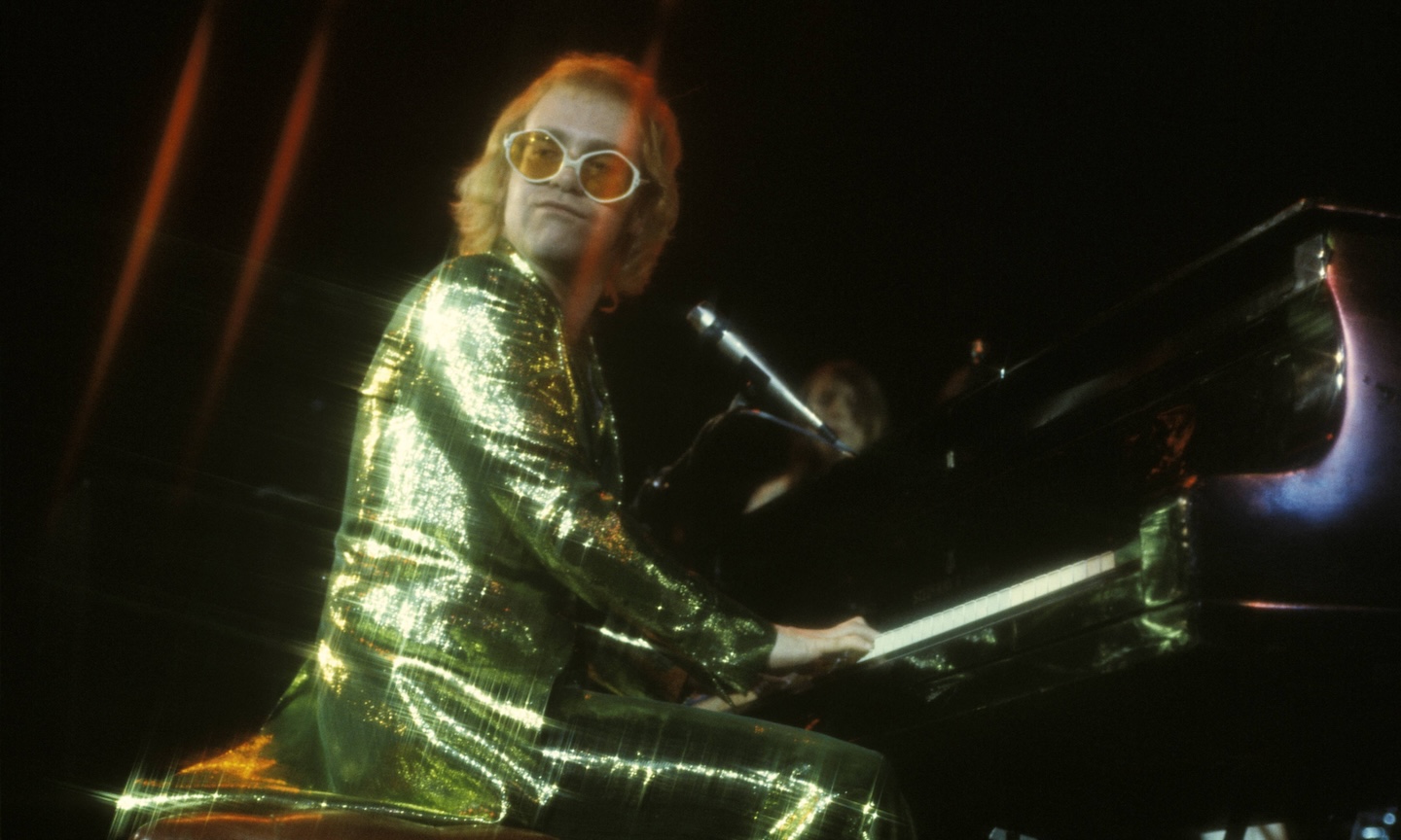 Cara Delevingne Stars As Elton John In New ‘Step Into Christmas’ Video