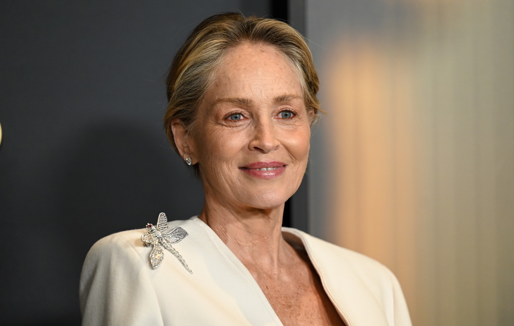 Sharon Stone shares tearful message with her younger self: “You’re going to make it”