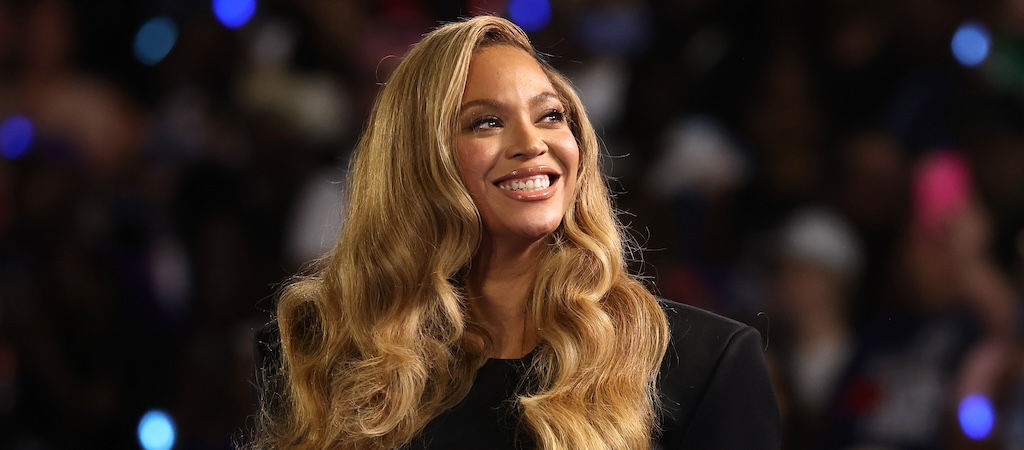 Beyoncé Lights A Christmas Cactus In A Massive Hat To Hype Up Her Halftime Performance For The Debut Of ‘NFL On Netflix’