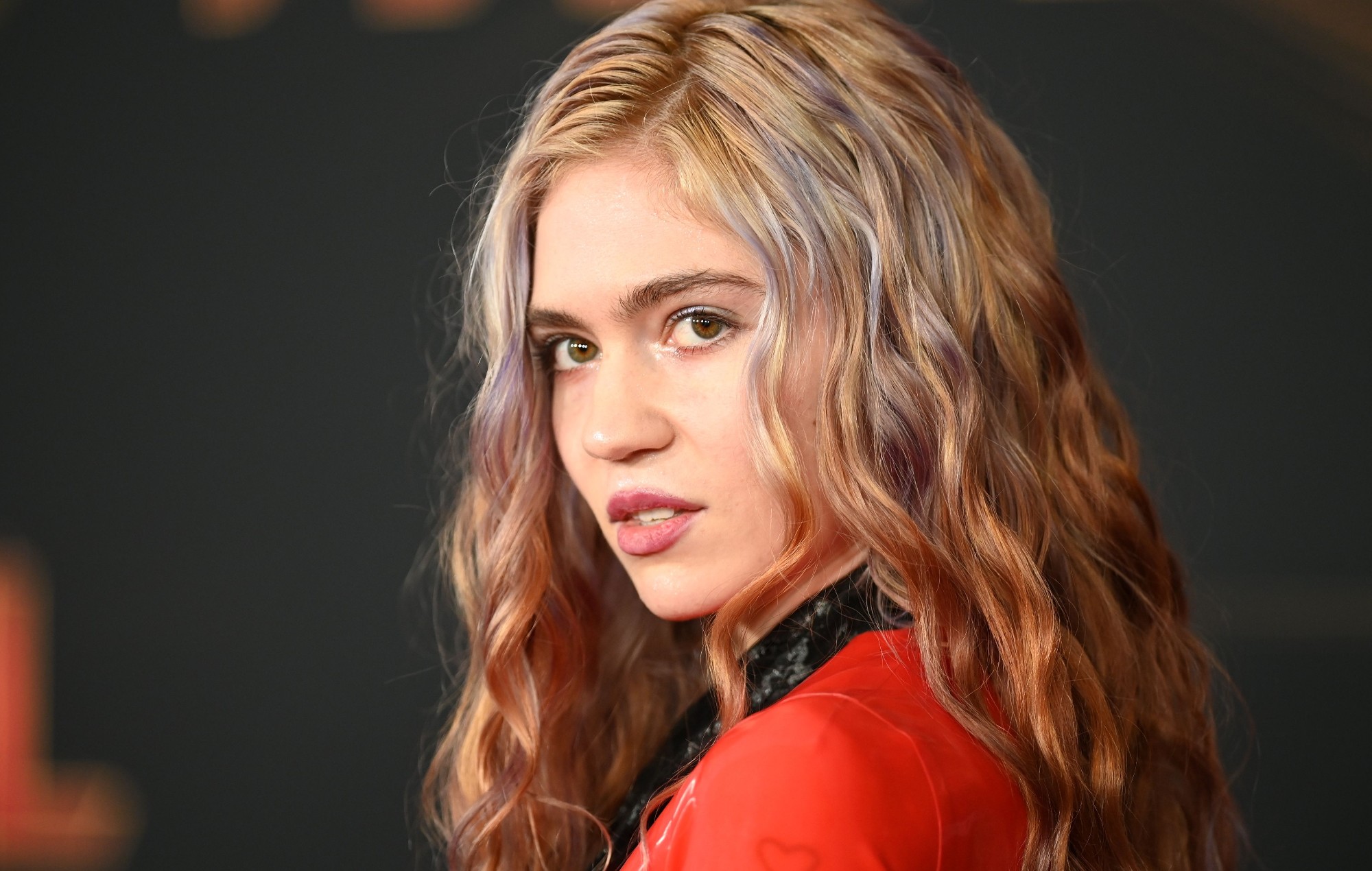 Grimes is “finally getting into Christianity” to “quit vaping”