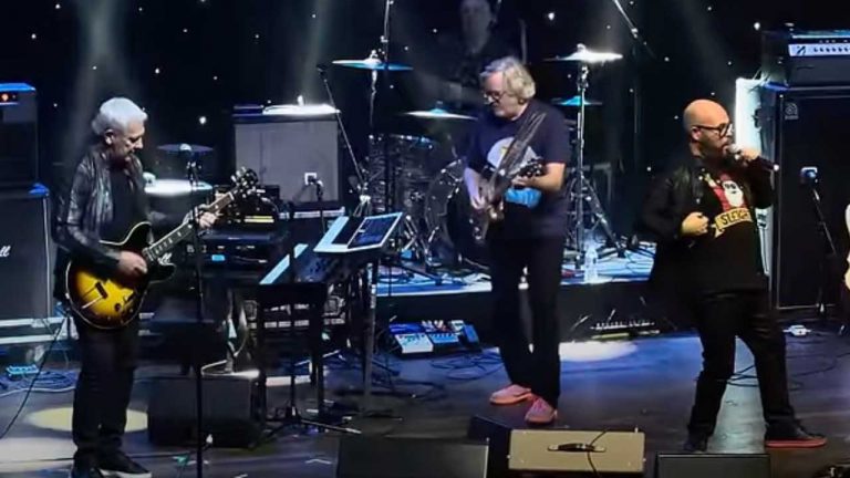 Rush’s Alex Lifeson has returned to the stage to play a Christmas-themed Black Sabbath cover with Barenaked Ladies