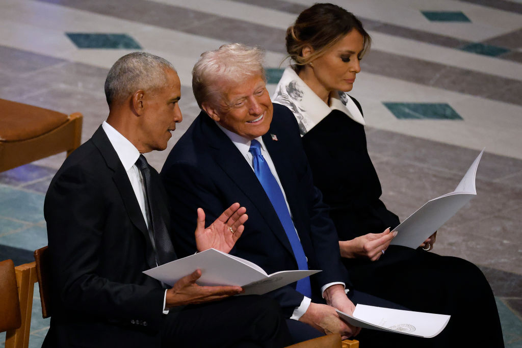 Trump and Obama’s Conversation At Jimmy Carter’s Funeral Sparks Online Talk