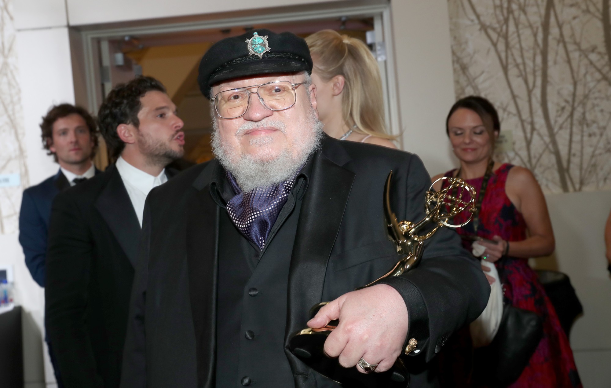 Fantasy author trolls George R. R. Martin about slow writing pace in new book dedication: “See it’s not that hard”