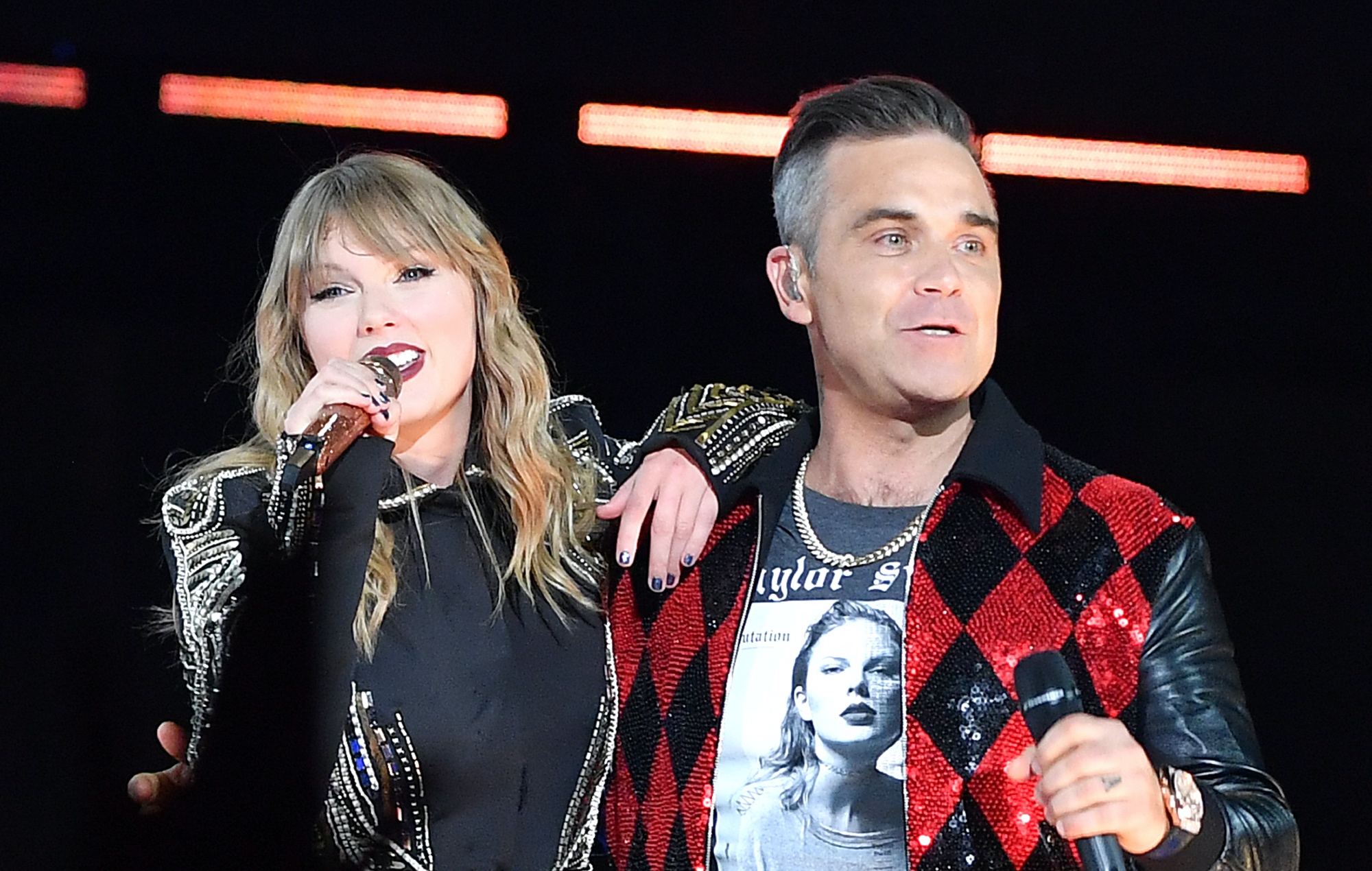 Robbie Williams doesn’t think Taylor Swift “knew anything about him” when she invited him on stage