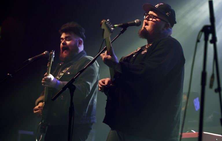 Watch “Boy George”, Bez and Jon McClure join The Lottery Winners on stage in Manchester