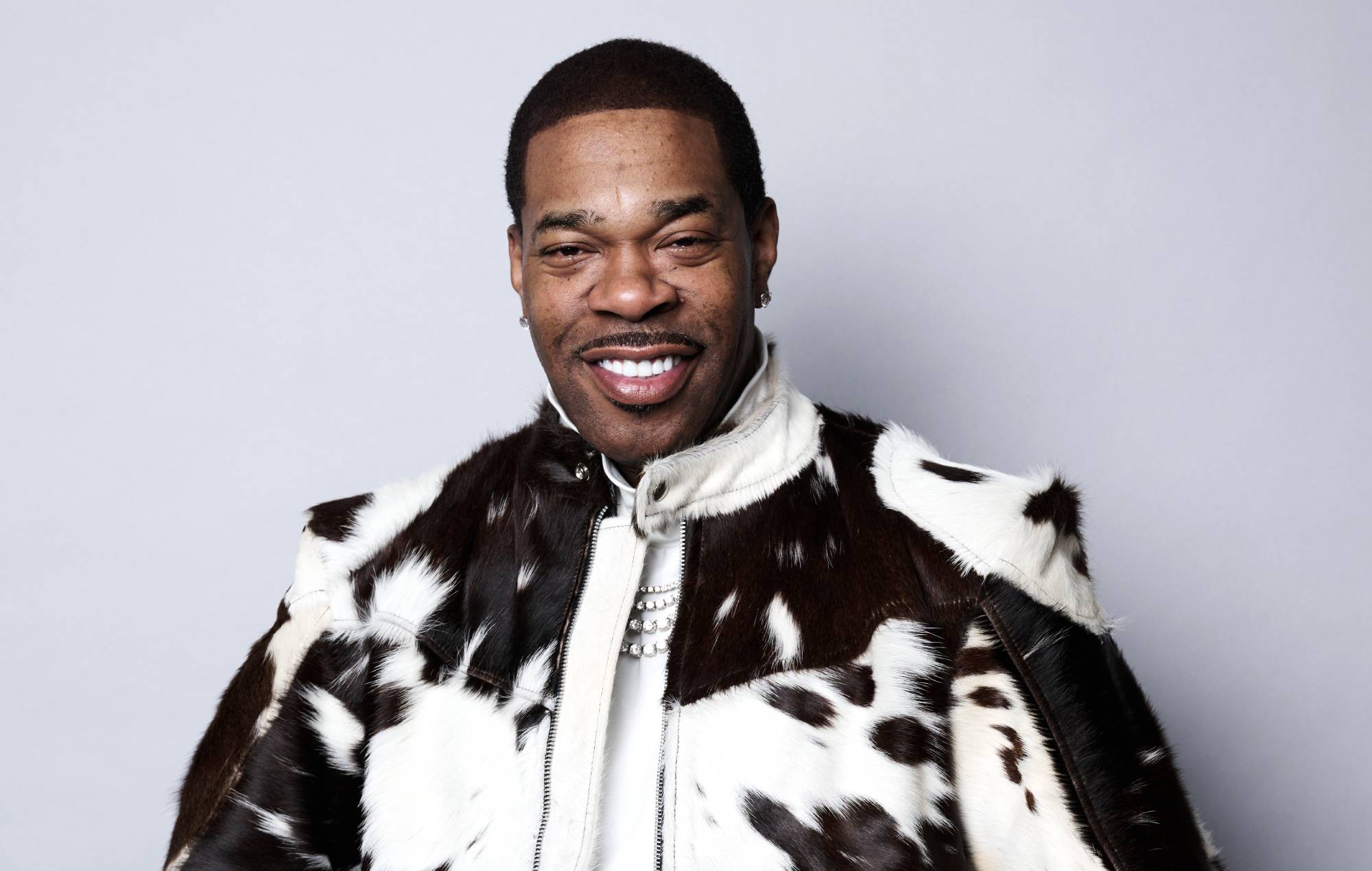 Busta Rhymes charged with assault after allegedly punching man in the face