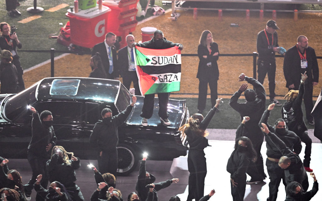 Meet Kendrick Lamar’s Dancer Who Raised Sudan & Gaza Flags at Super Bowl