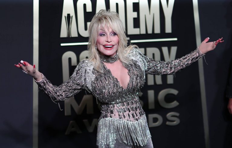 Dolly Parton musical suspended over homophobic abuse in Manchester as star speaks out