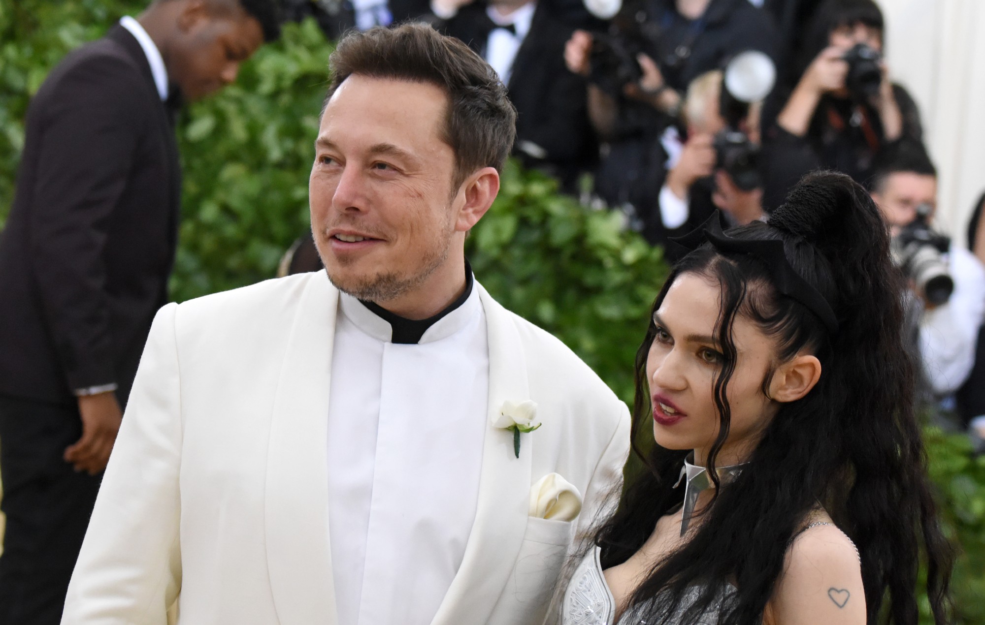 Grimes asks people to “stop posting images of my kid everywhere” after Elon Musk White House viral images