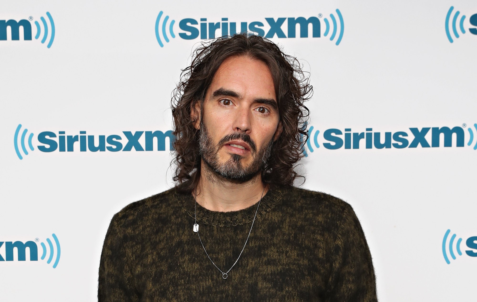 Russell Brand moves to the US amid BBC apology to staff over his conduct