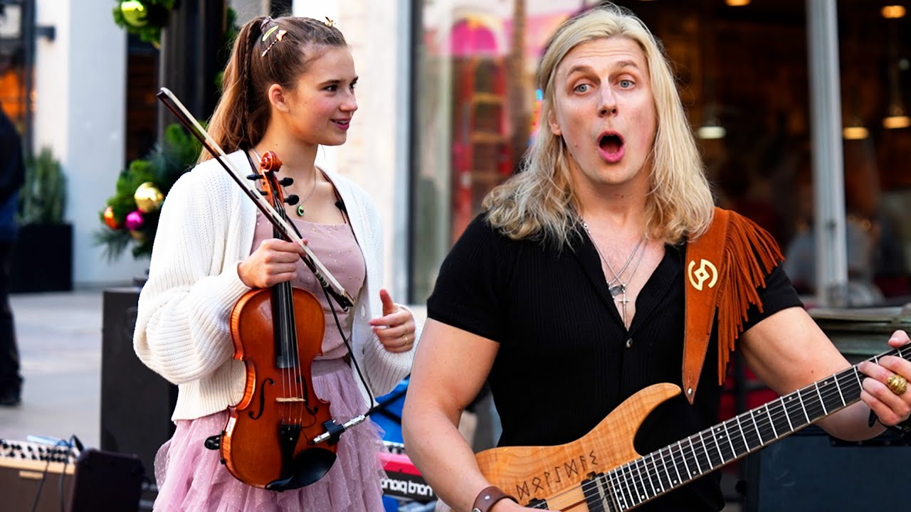 “Do you know Led Zeppelin’s Whole Lotta Love?”: Over in Santa Monica, a Lithuanian guitarist and a Ukrainian violinist are busking their way to YouTube fame and fortune