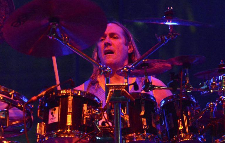 Watch Tool’s Danny Carey show off the drum bike he invented