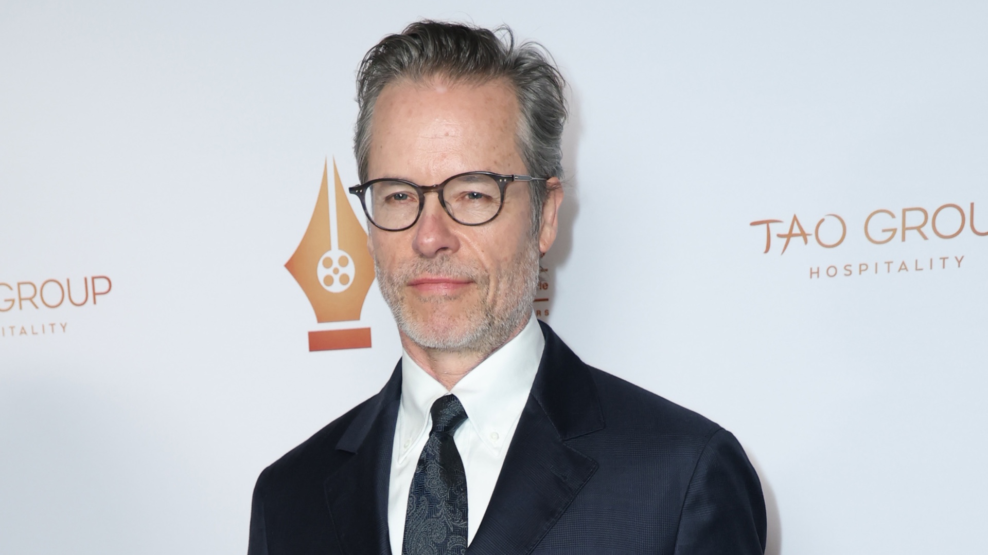 Guy Pearce “wanted to punch” “snobby” actress who mocked his work on ‘Neighbours’