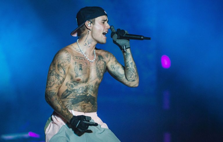 Justin Bieber raps about being “high” in new video after denying drug use