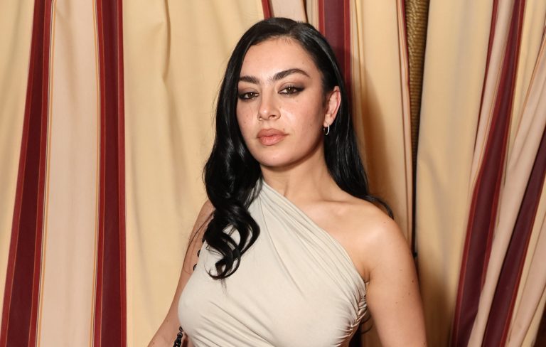 Charli XCX gets heated in debut clip from new film ‘Overcompensating’
