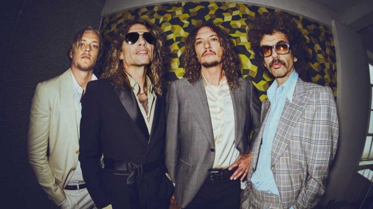 “When the storm clouds clear, the band’s innate pop sensibilities shine as brightly as ever”: In a world of bread-and-butter rock bands, The Darkness remain the toast of the town