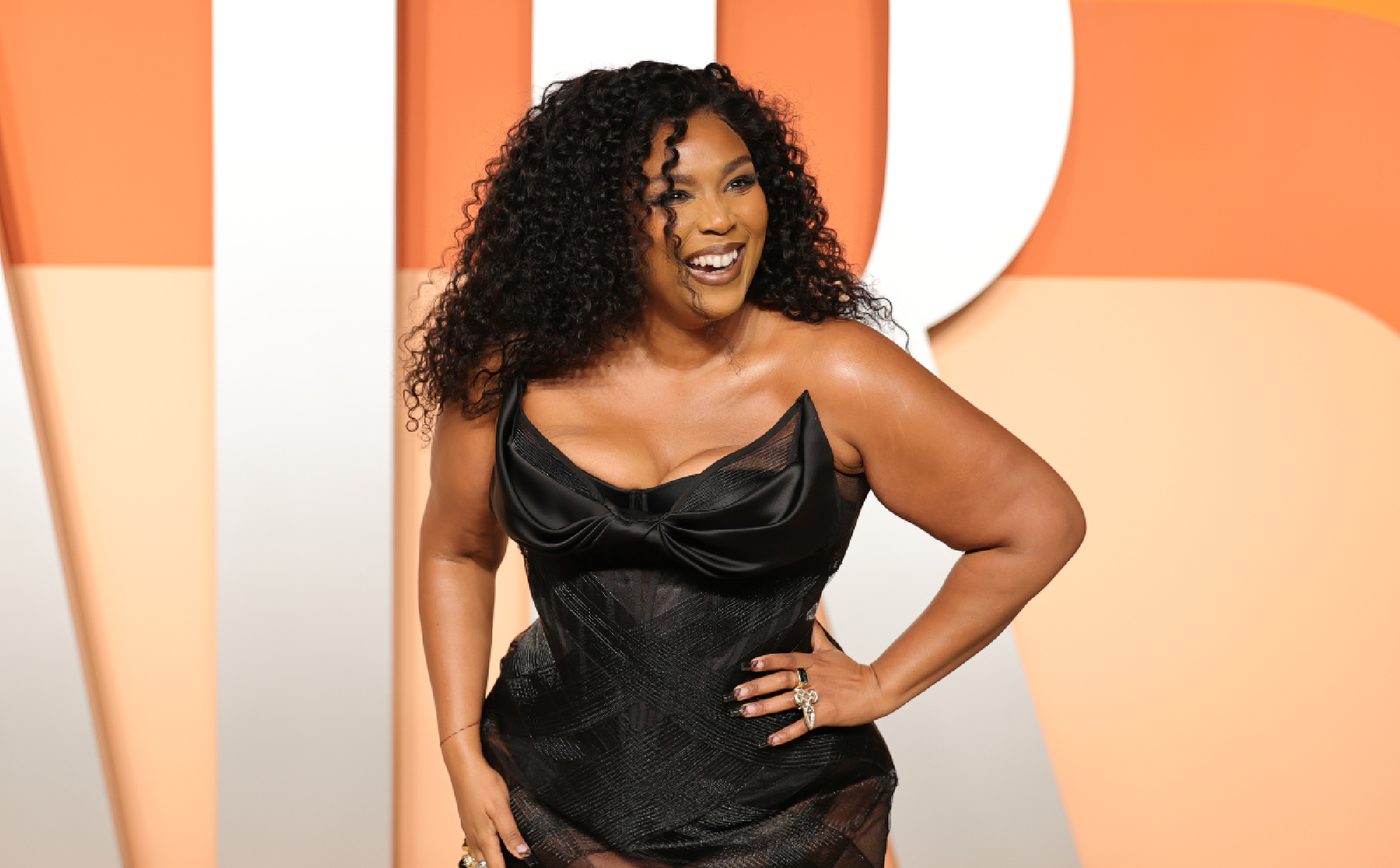 Lizzo teases another song from new album ‘Love In Real Life’: “I’m bouta throw my phone away”