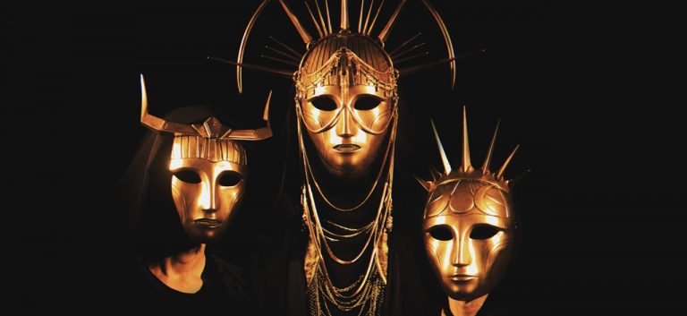 “Those sultry licks get weirder and weirder, until they resemble the sound of a UFO taking off.” Masked metal weirdos Imperial Triumphant go straight on new album Goldstar