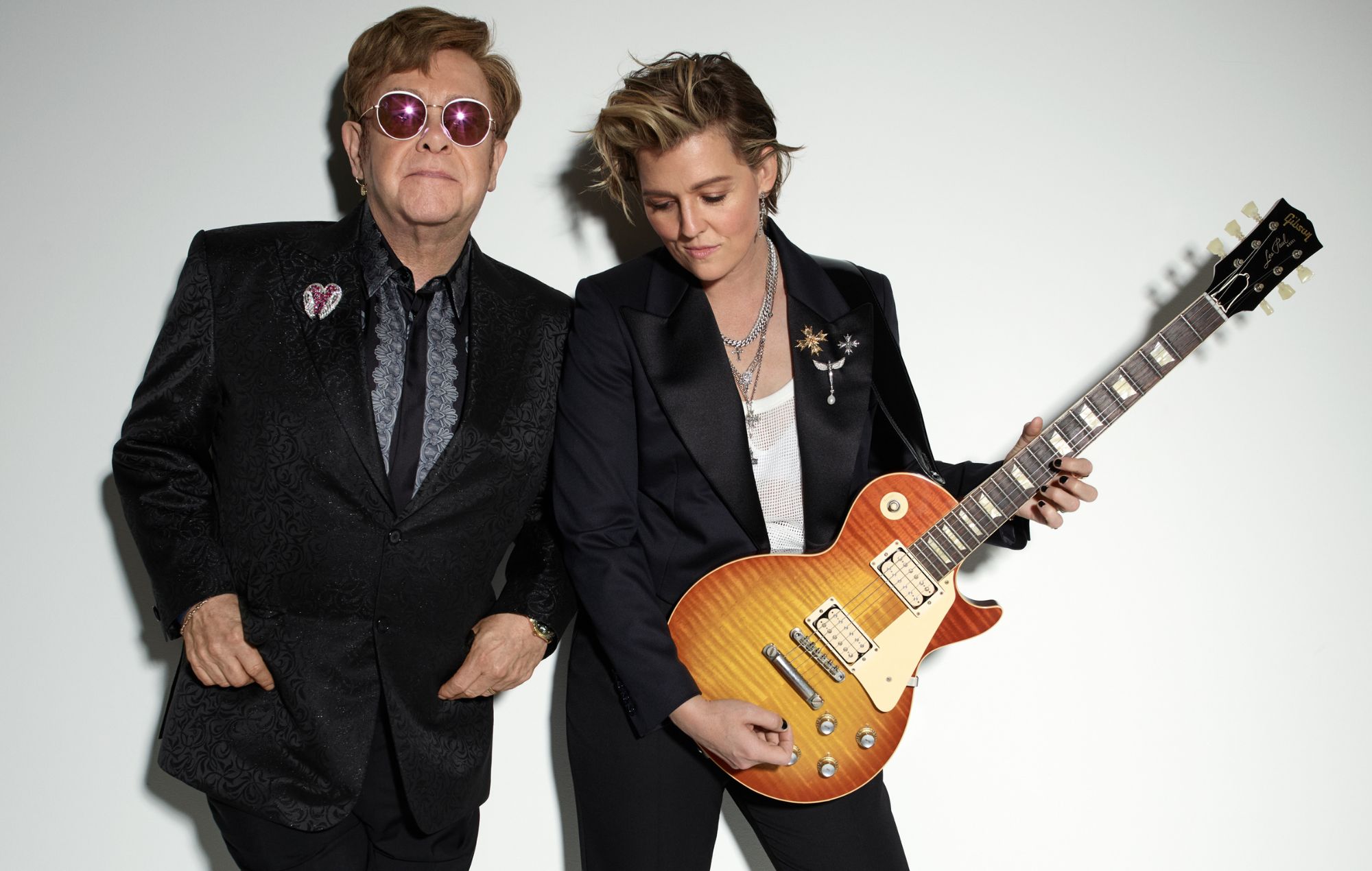 Listen to Elton John and Brandi Carlile’s new “anthem for young gay kids”, ‘Swing For The Fences’