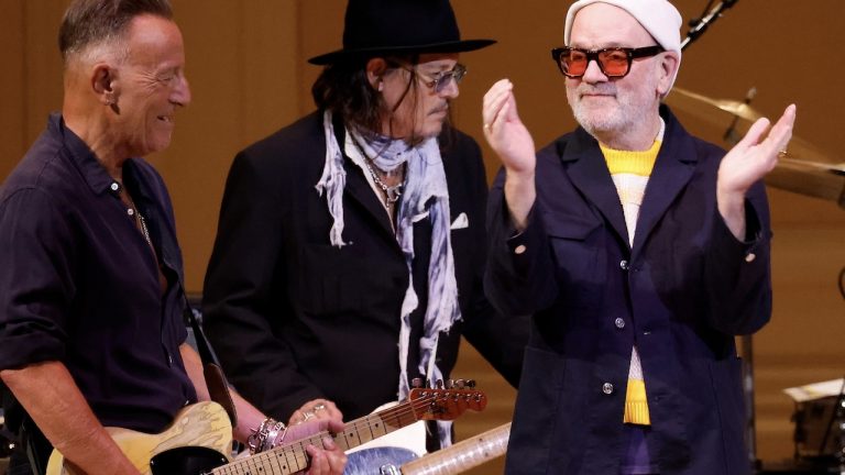 Watch Bruce Springsteen unleash his inner guitar hero, and jam with Flea, Johnny Depp and R.E.M.’s Michael Stipe, in powerful tribute to Patti Smith at New York’s iconic Carnegie Hall