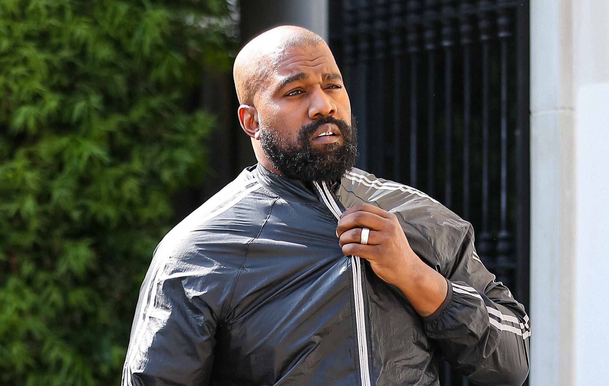 Kanye West teases Sunday Service return then posts photo of KKK robe