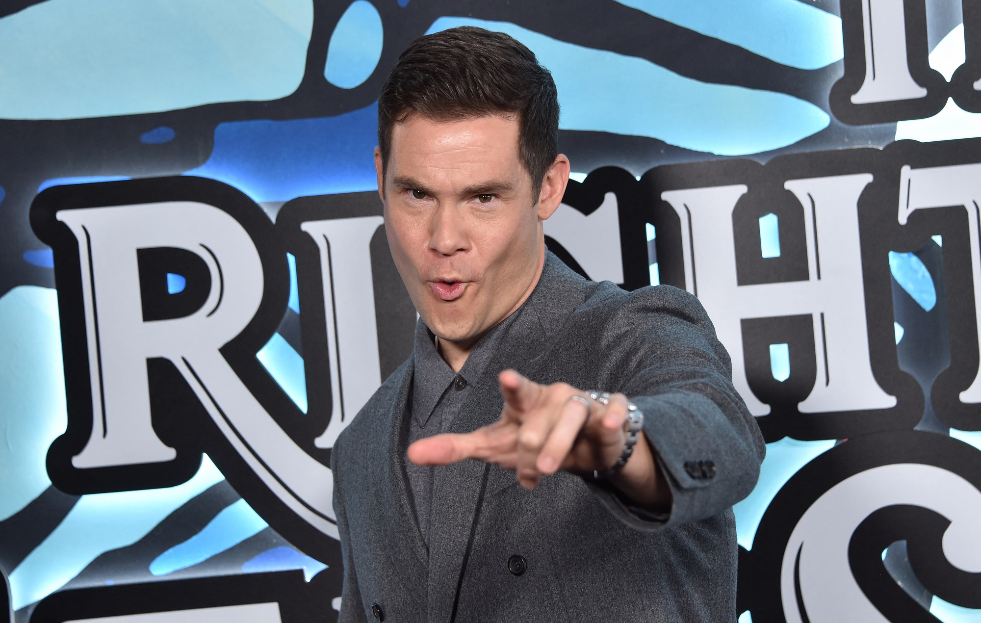‘Modern Family’ actor Adam Devine told he “may be dying” due to injuries from cement truck accident during childhood