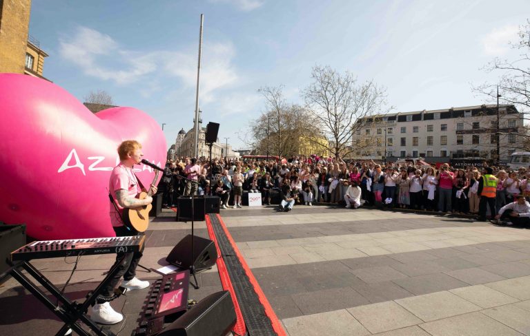 Watch Ed Sheeran play surprise pop-up show at London’s King’s Cross station