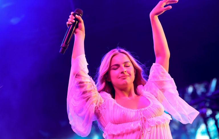 Addison Rae announces album release date on her underwear during Arca’s Coachella set