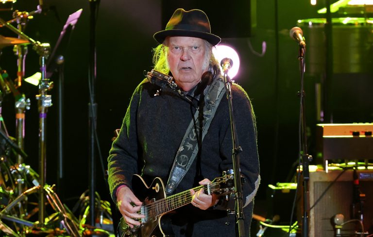 Watch Neil Young debut a new song and take a jab at Elon musk: “If you’re a fascist, get a Tesla”