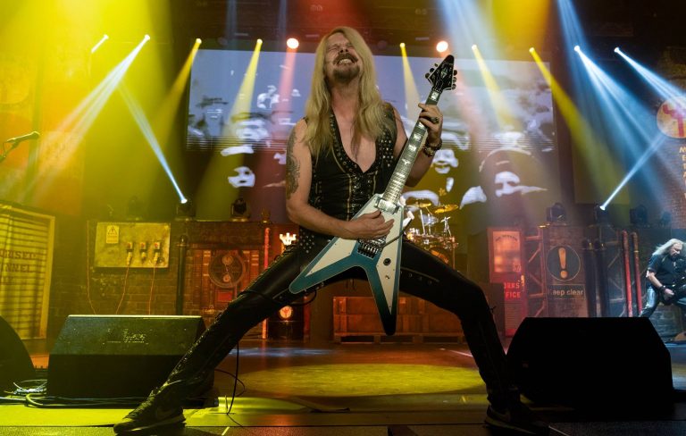 Judas Priest guitarist Richie Faulkner “struggling” to play after suffering stroke that led to brain damage