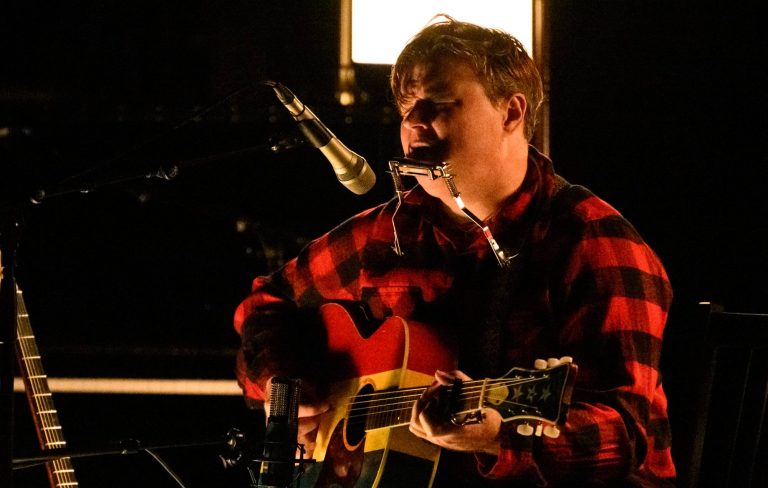 Ryan Adams storms off stage during “chaotic” Belfast set: “I’m not coming back until you stop flashing”