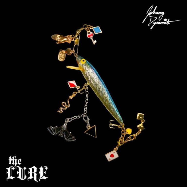 Johnny Dynamite Drifts Through Alleyways in His Video for Heartfelt Synth-Pop Anthem “The Lure”