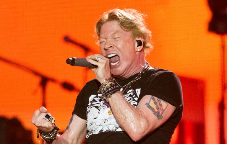 Guns N’ Roses share compilation of Axl Rose falling onstage: “Greatest hits!”