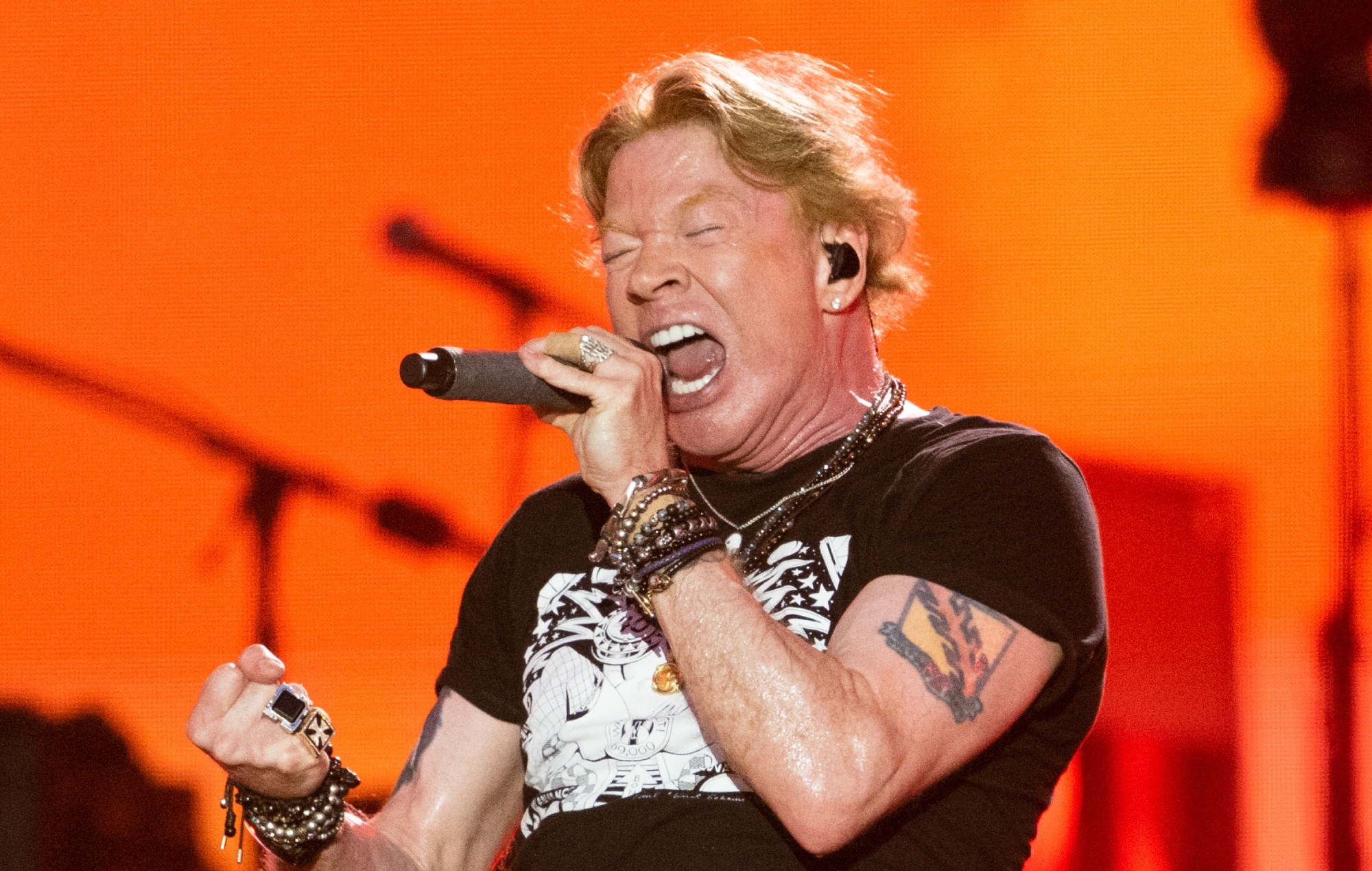 Guns N’ Roses share compilation of Axl Rose falling onstage: “Greatest hits!”