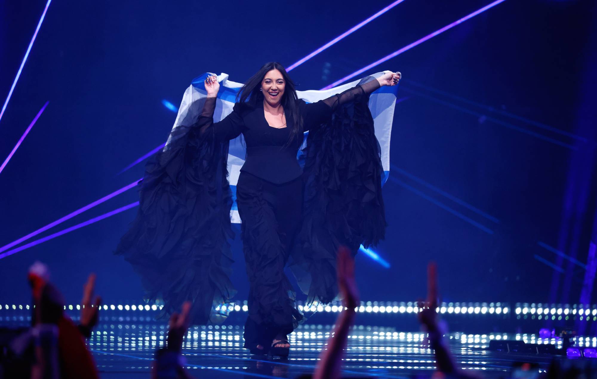 Eurovision crew member hit with paint as two protesters attempted to disrupt Israeli performance