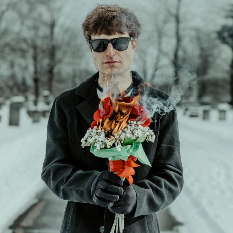 Boston Post-Punk Outfit Burn Kit Haunt a Snow-Draped Cemetery Chapel in Their Video for “High Spirits Don’t Live Here”