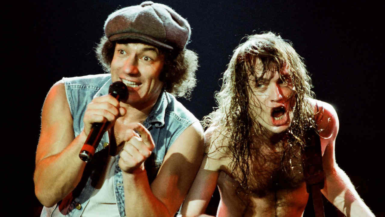 “David Coverdale’s had to become a pop singer to get success. There’s your glamour bands and your denim-clad groups. And your denim-clad groups survive”: How AC/DC swam against the 80s hair metal tide and made an underrated gem in Blow Up Your Video
