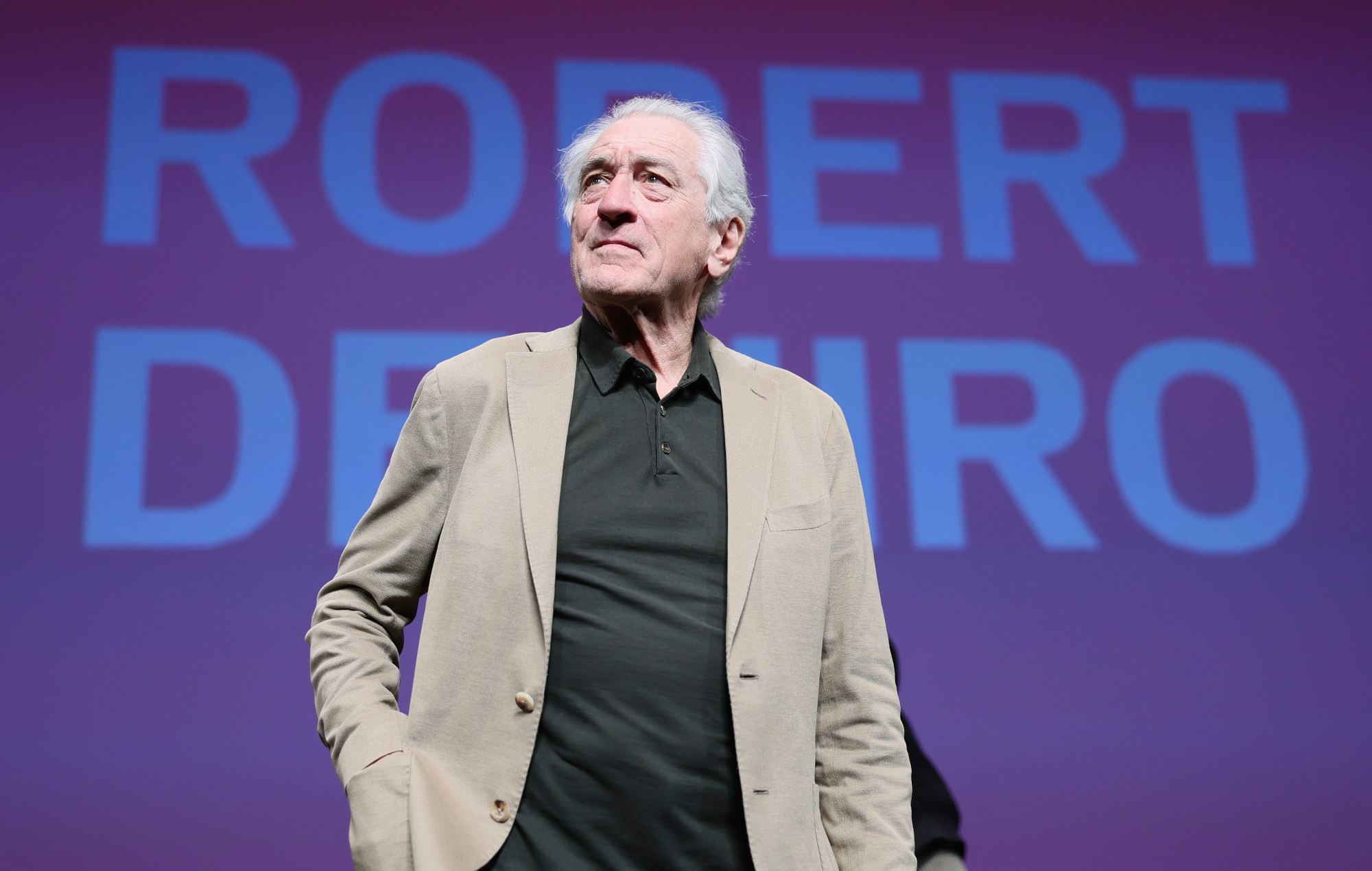 Robert De Niro says world has to “stand up” to “bully” Donald Trump