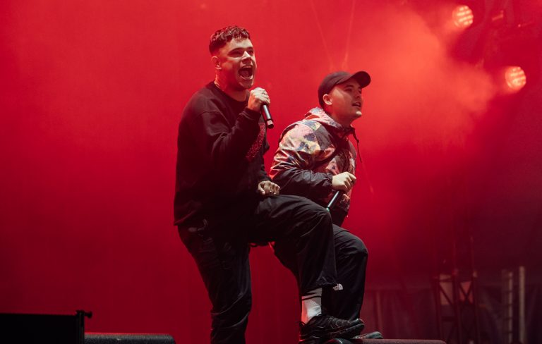 Kneecap respond as Keir Starmer and Kemi Badenoch call for Glastonbury ban: “You know what’s ‘not appropriate’ Keir? Arming a fucking genocide…”