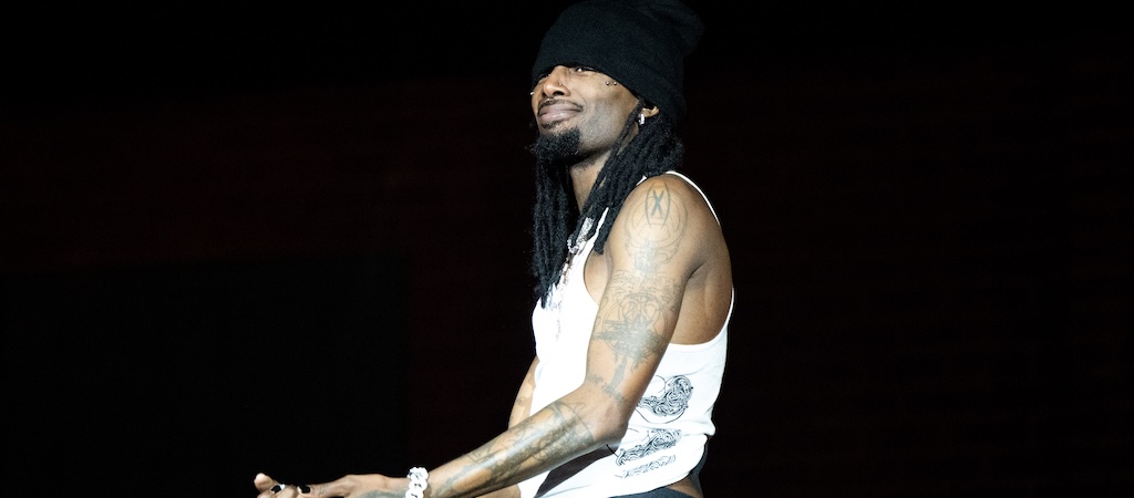 Travis Scott Surprised Playboi Carti Fans At The Rapper’s Chicago Show With The Weeknd