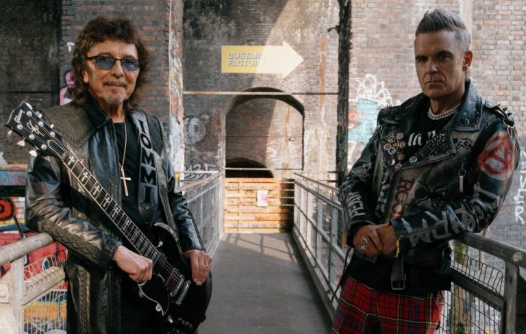 Watch Robbie Williams and Tony Iommi discuss collaboration in behind-the-scenes footage of ‘Rocket’ music video