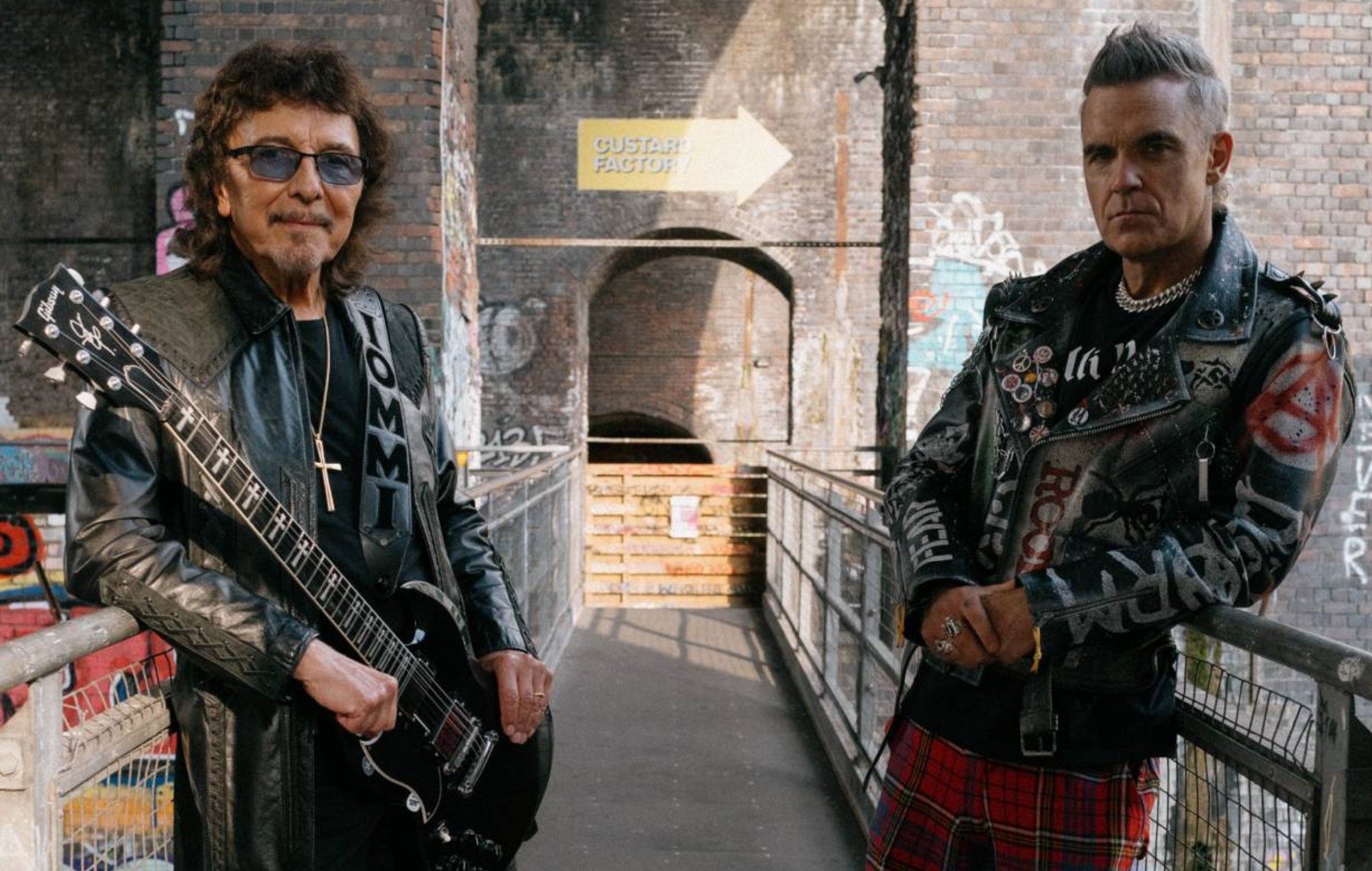 Watch Robbie Williams and Tony Iommi discuss collaboration in behind-the-scenes footage of ‘Rocket’ music video