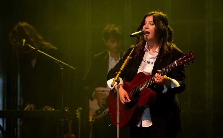 Watch Lucy Dacus officiate several marriages at show in Philadelphia
