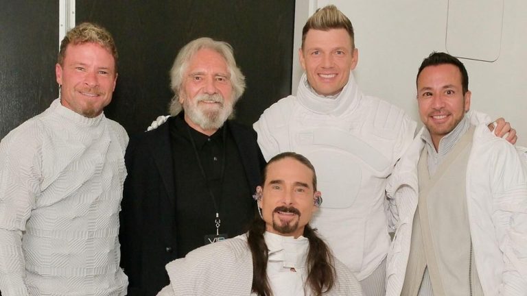 Who do we contact about putting this photo of Black Sabbath’s Geezer Butler with the Backstreet Boys up in the National Portrait Gallery?