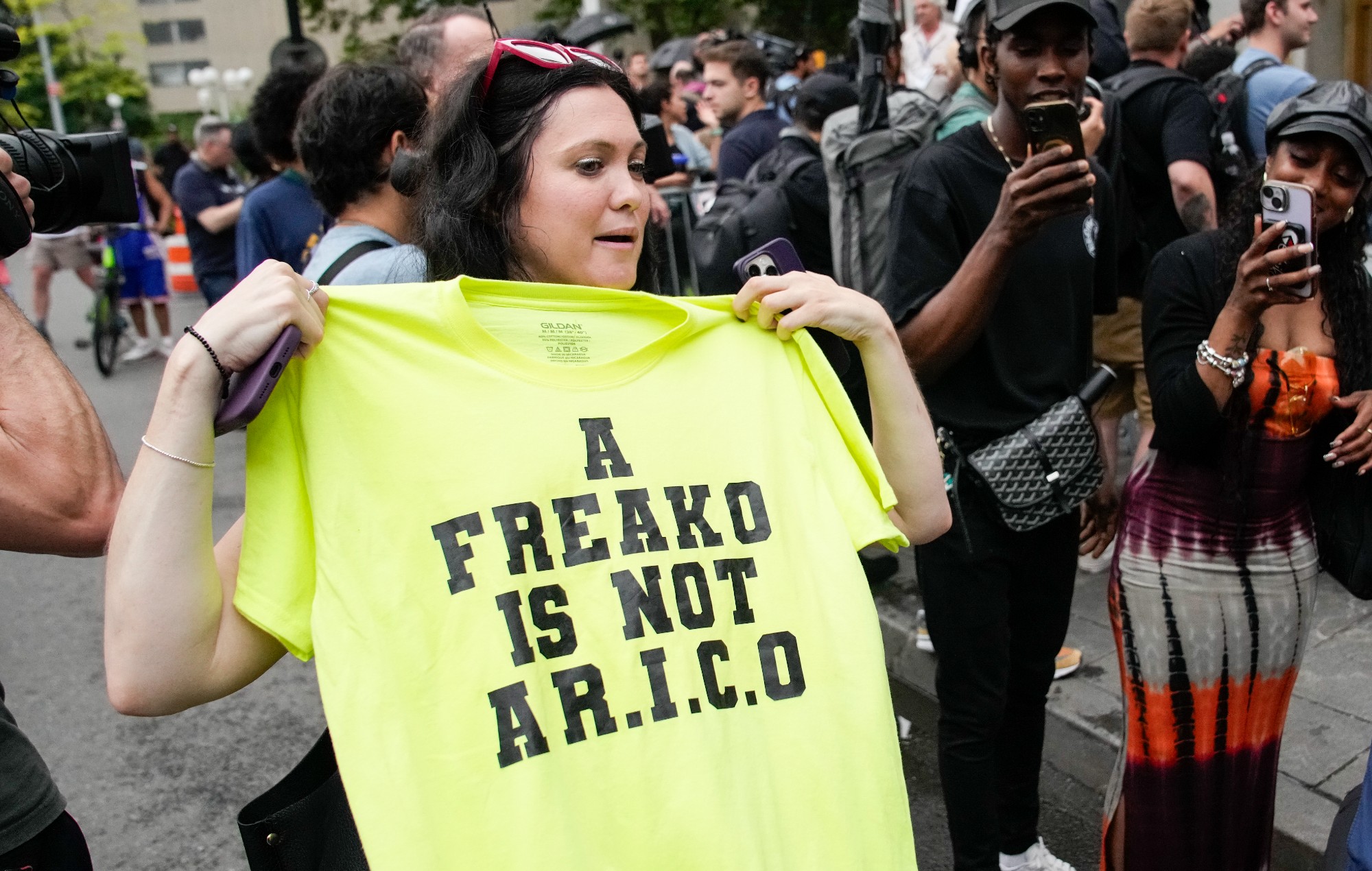 Diddy fans douse themselves in baby oil outside of courthouse to celebrate rapper’s acquittal of sex trafficking charges