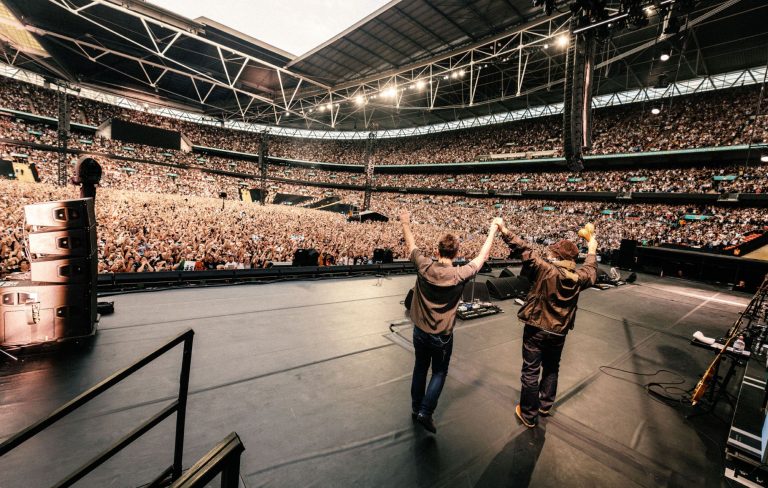 Watch Oasis get Wembley Stadium to do The Poznan with Dua Lipa and Jarvis Cocker in the crowd