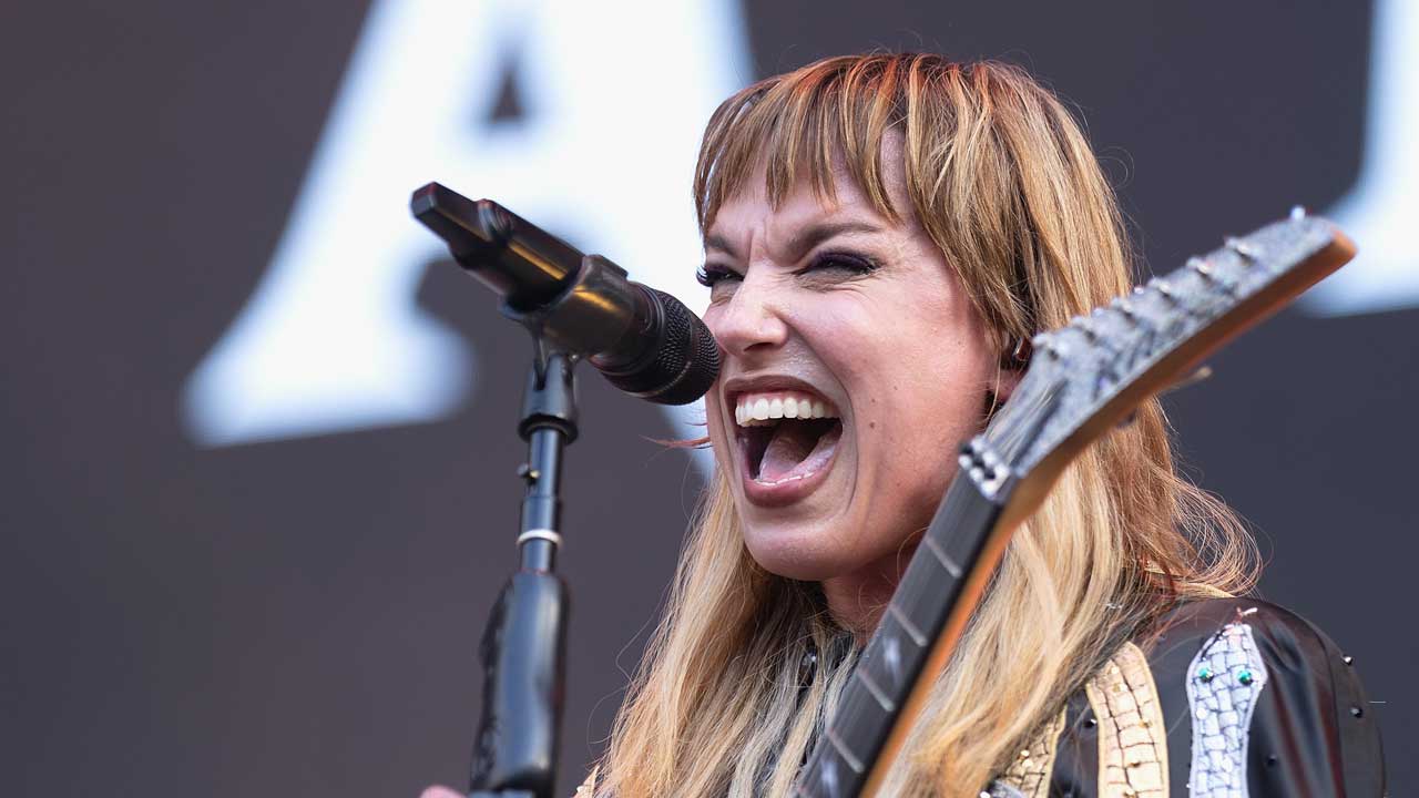 “We are all fifteen-year-old boys. The fart jokes were rampant”: Lzzy Hale reflects on touring with Skid Row