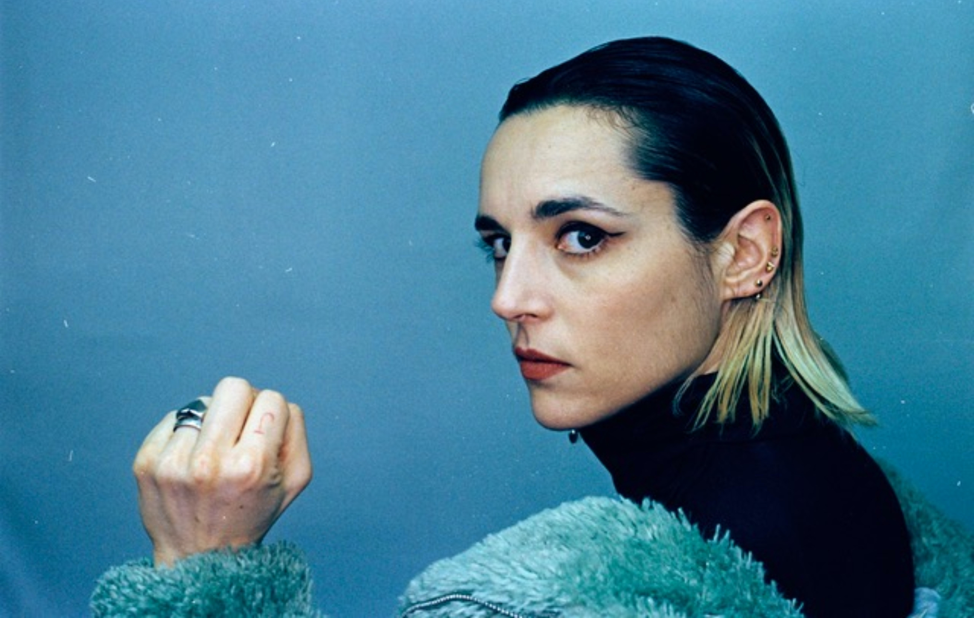 Jehnny Beth fends off “brain rot caused by endless phone scrolling” on relentless new single ‘High Resolution Sadness’  