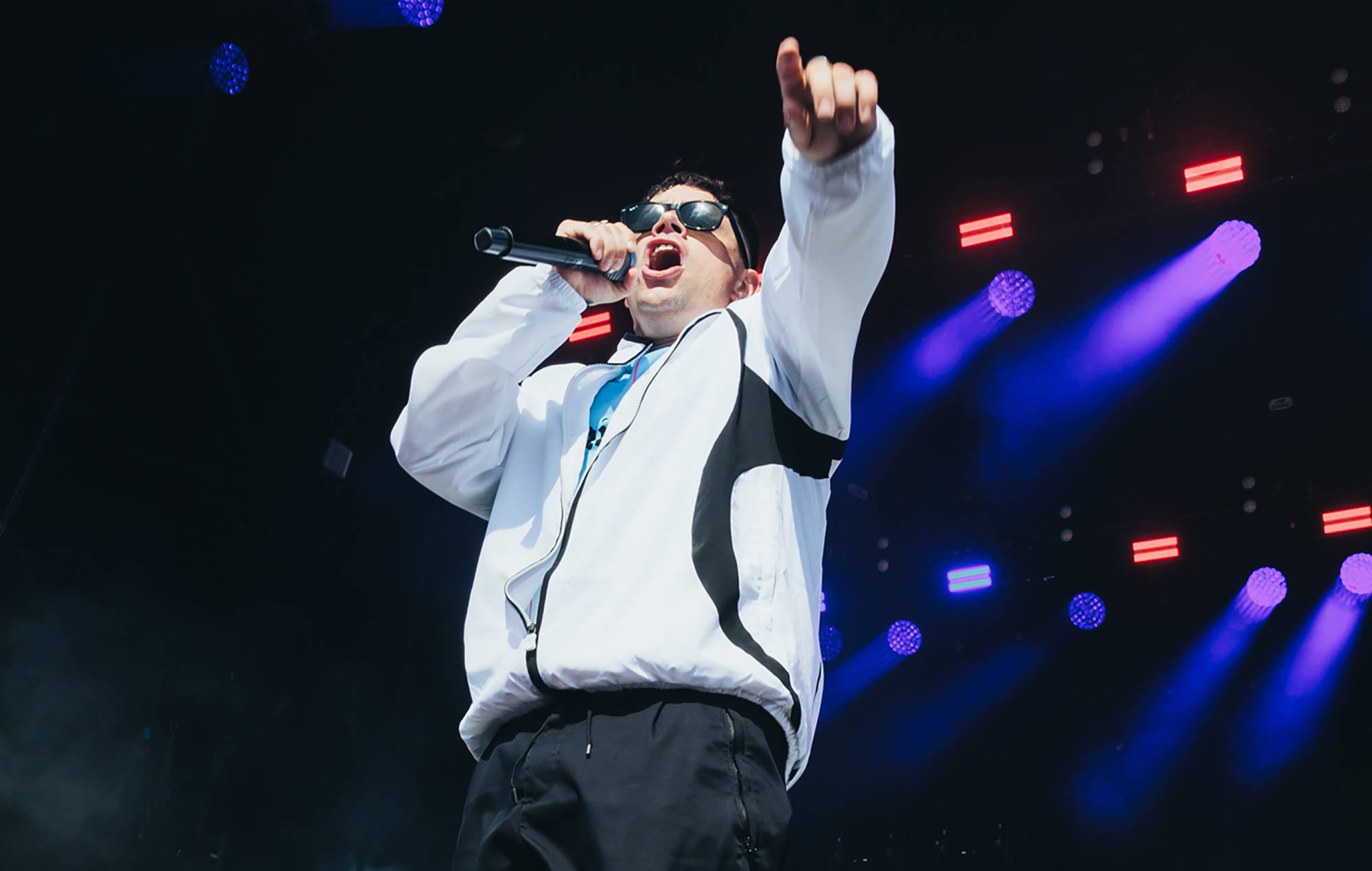 Kneecap’s Móglaí Bap leads “free Palestine” chant during surprise appearance at Féile an Phobail